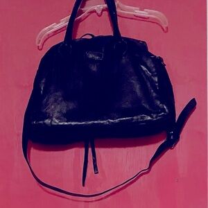 Leather handbag middle zippered compartment  zippered pocket and two side pocket